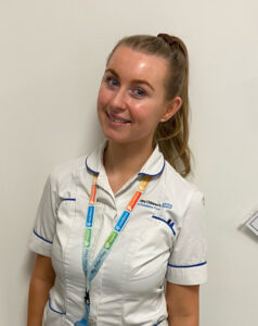 Young female pharmacy apprentice