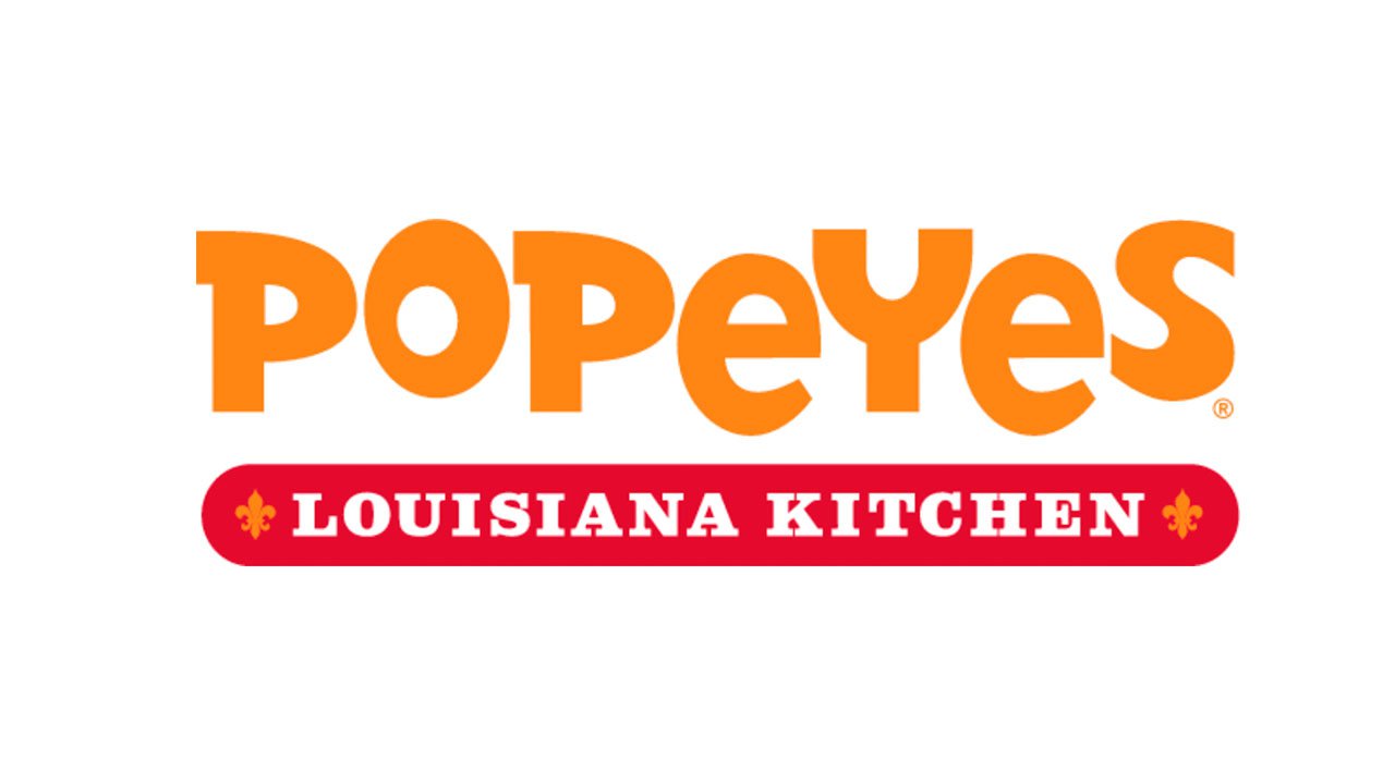 Popeyes logo orange text