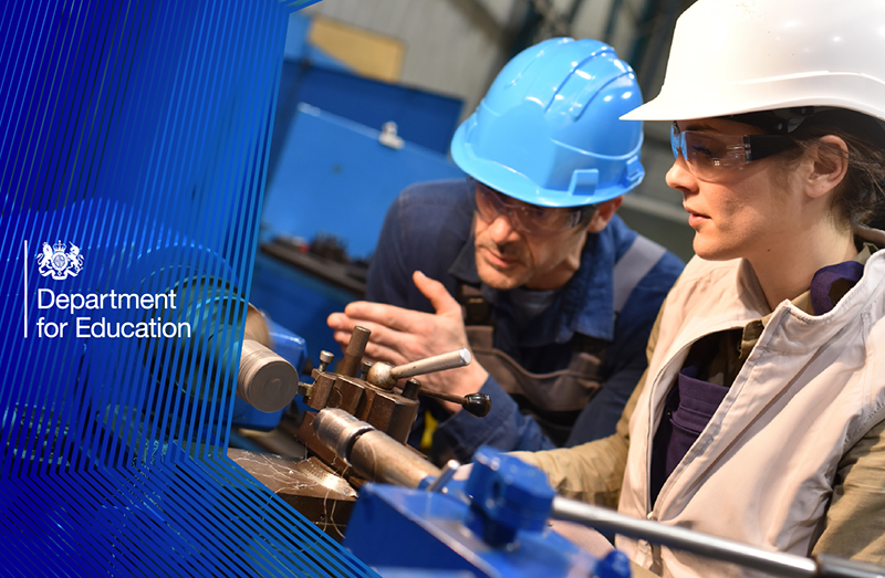 Young female and male engineers working together