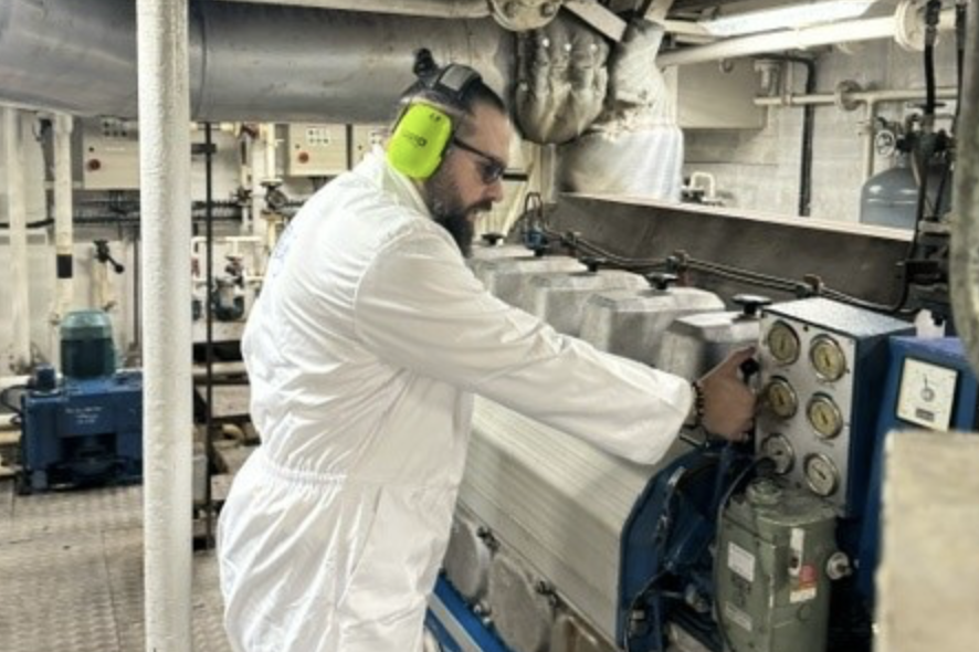 Picture of male engineer working on machinery equipment