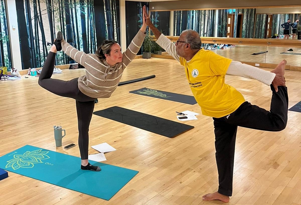 Yoga students taking part in teaching class