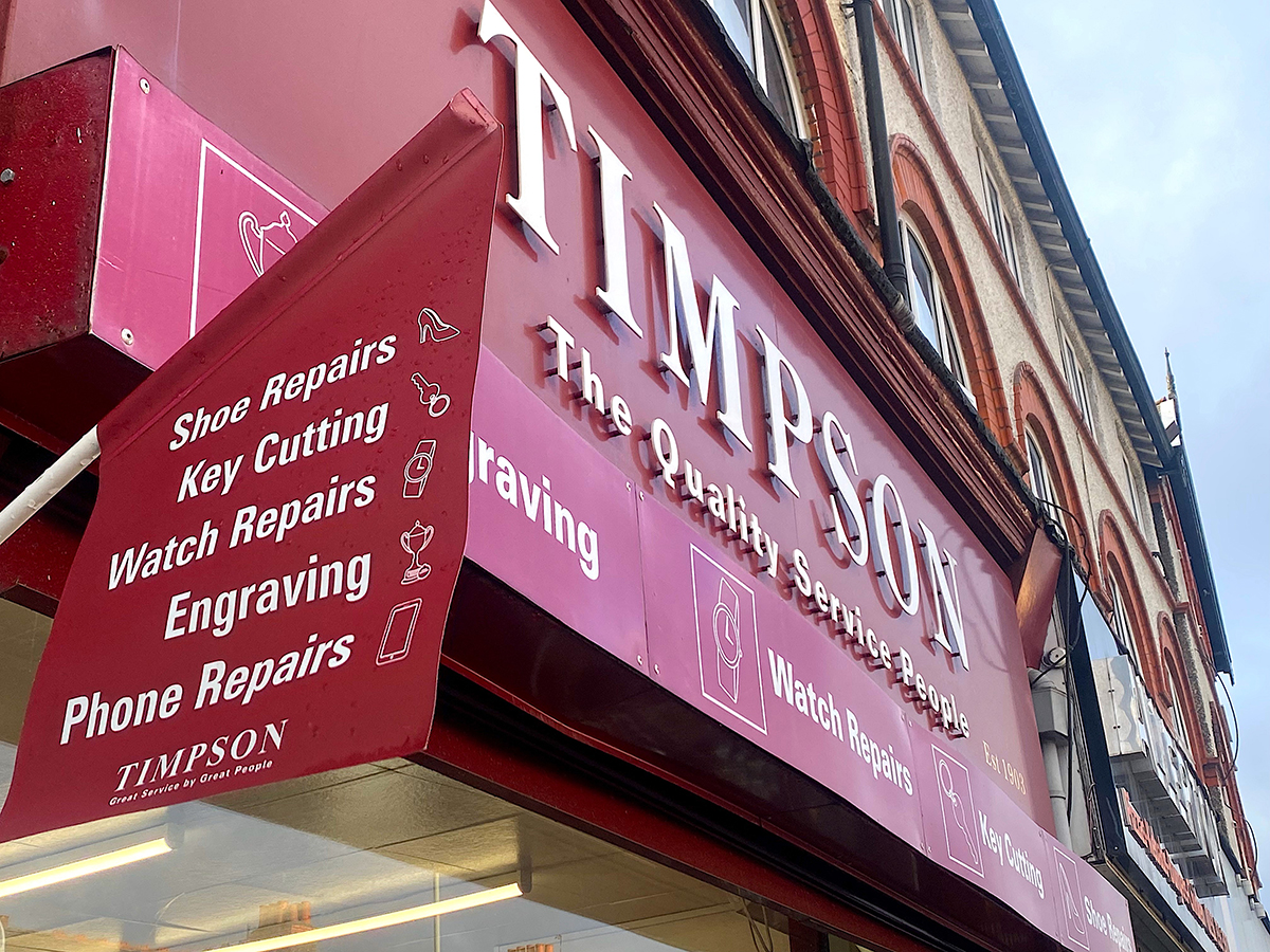 Shop front signage for Timpsons key cutters and shoe repairs